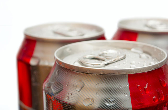 What benefits are available to injured Coca-Cola employees?